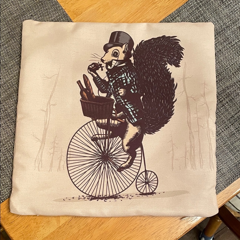 Squirrel on Bicycle Throw Pillow